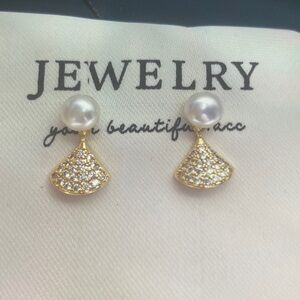 Gold and Pearl Stud Earrings